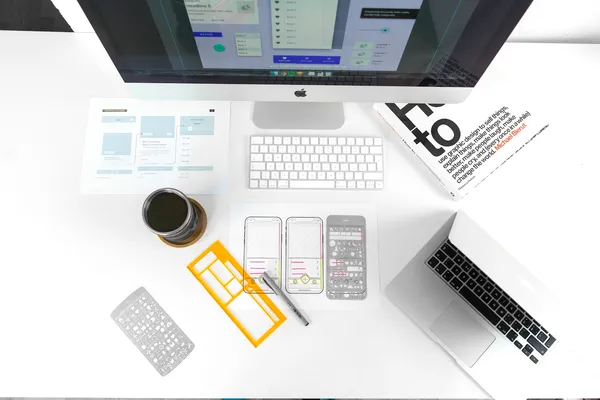 Designer working on brand identity — Banua Coder brand and grow