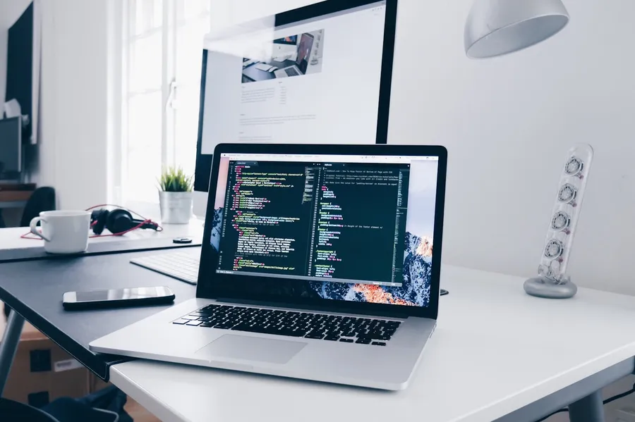 Engineer at laptop — maintenance and system support